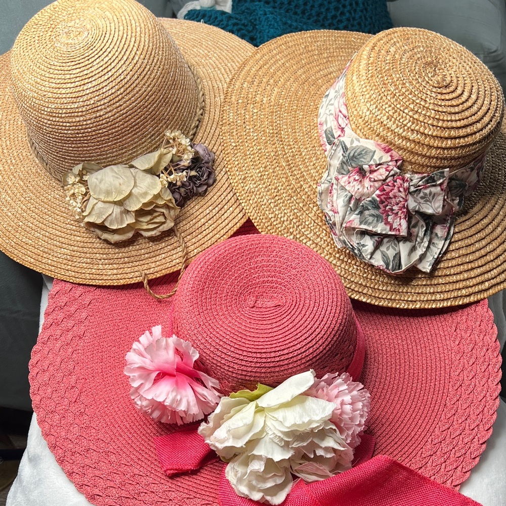 Stylish Straw and Pink Sun Hats with Floral Accents